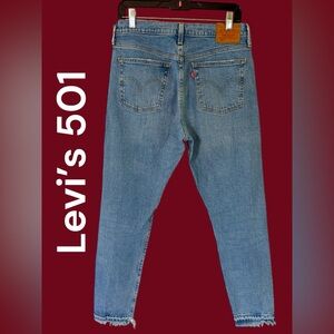 Levi’s-women’s button fly 501 jeans. 28x28 light wash/frayed hem. Excellent cond